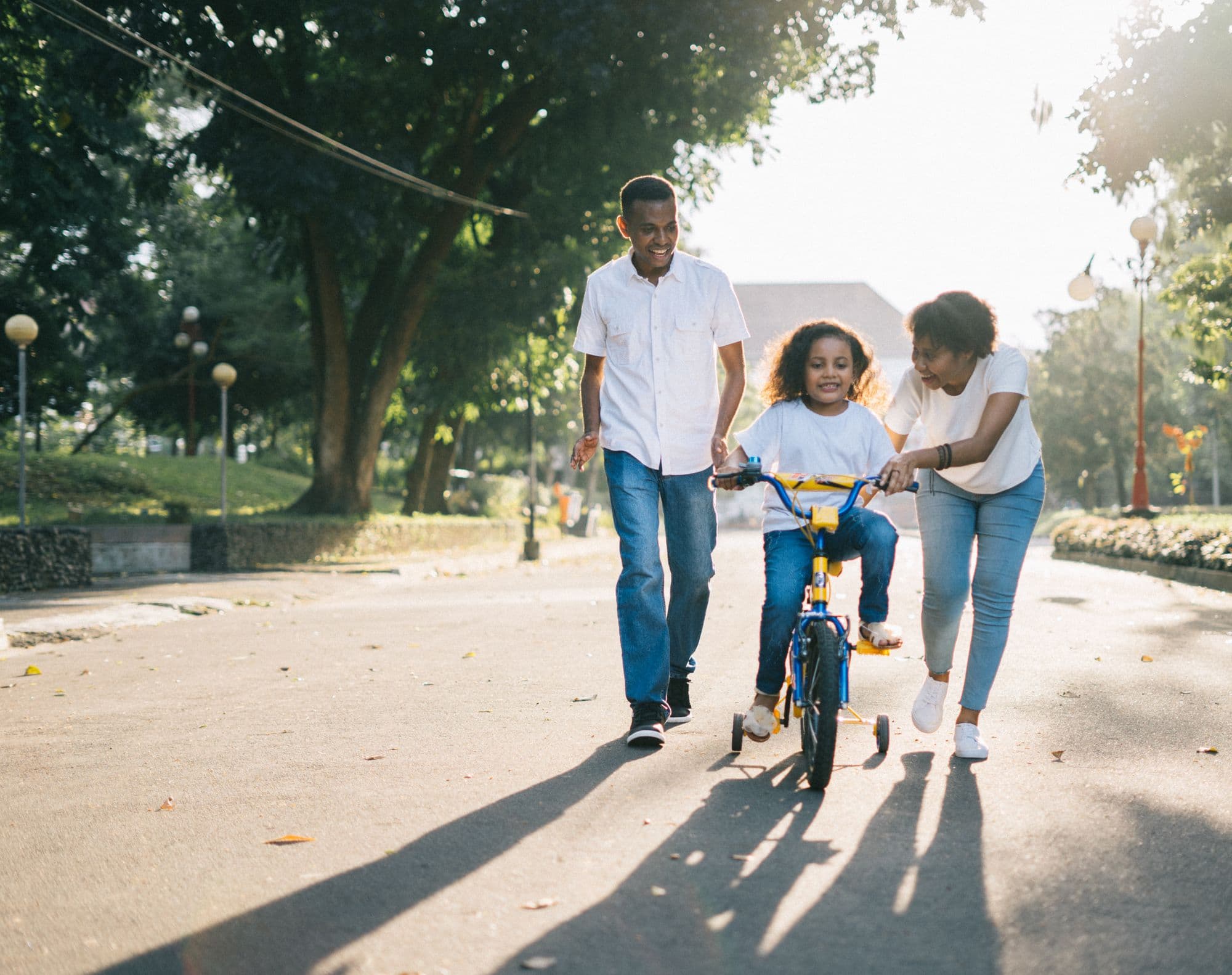 A family enjoying time together outdoors. Concept lifestyle photograph, not Haven Family Dentistry patients.